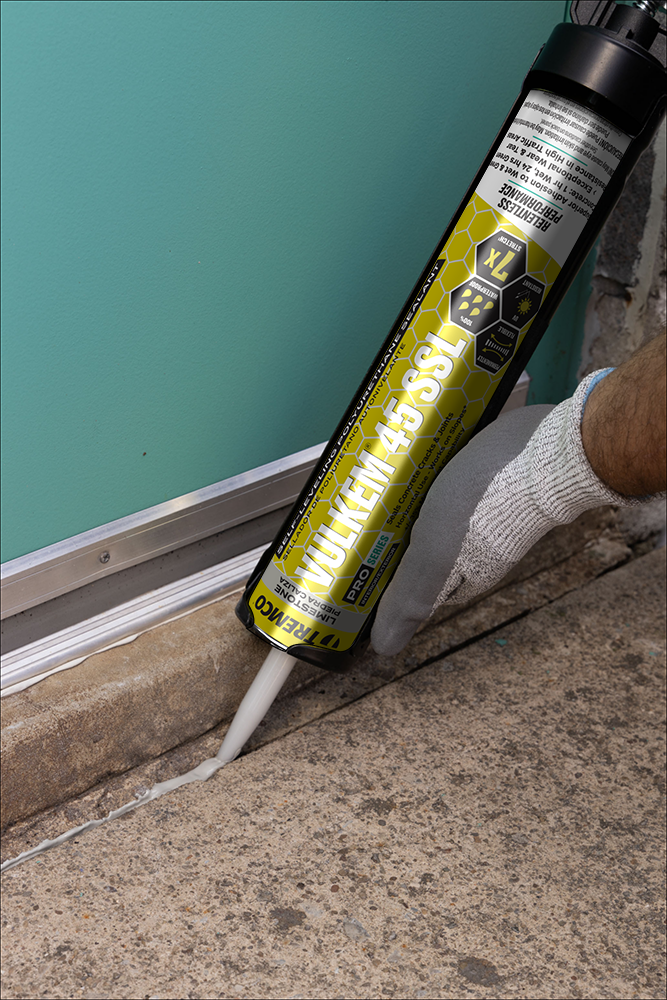 Tremco Vulkem 45SSL semi-self-levelling sealant tooled in a concrete joint